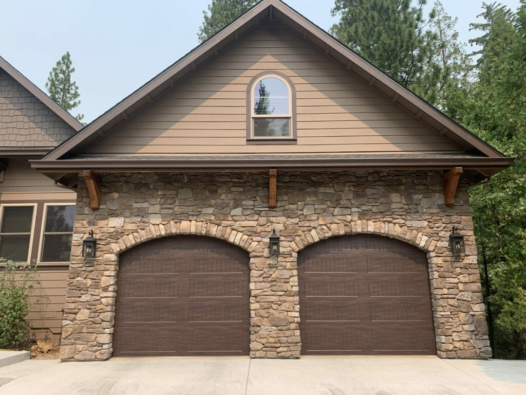 Two CHI Woodgrain garage door installed in a home in Sonora CA.